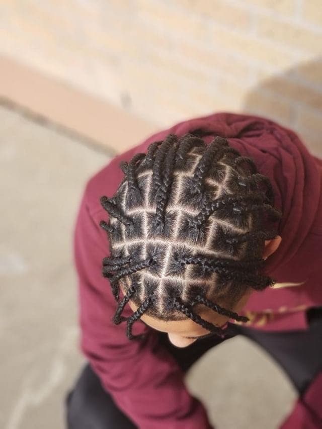 Men’s braids with crisp square parts, top view