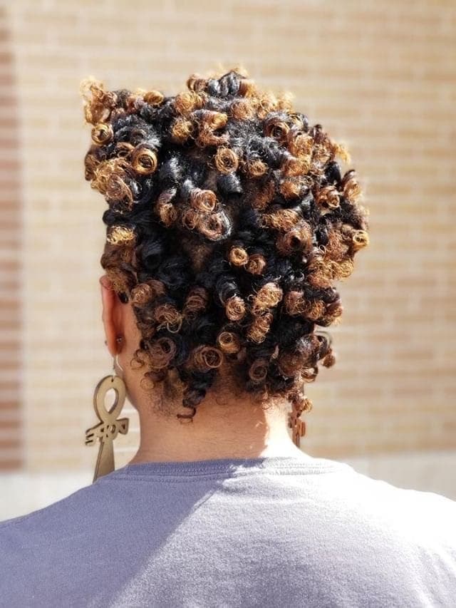 Curly updo with honey highlights